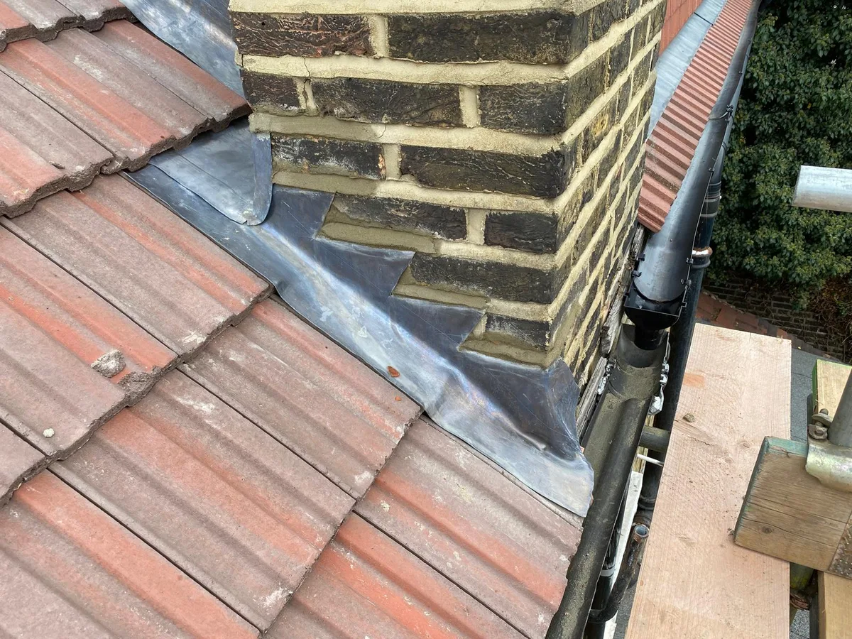 Fresh leadwork around a chimney