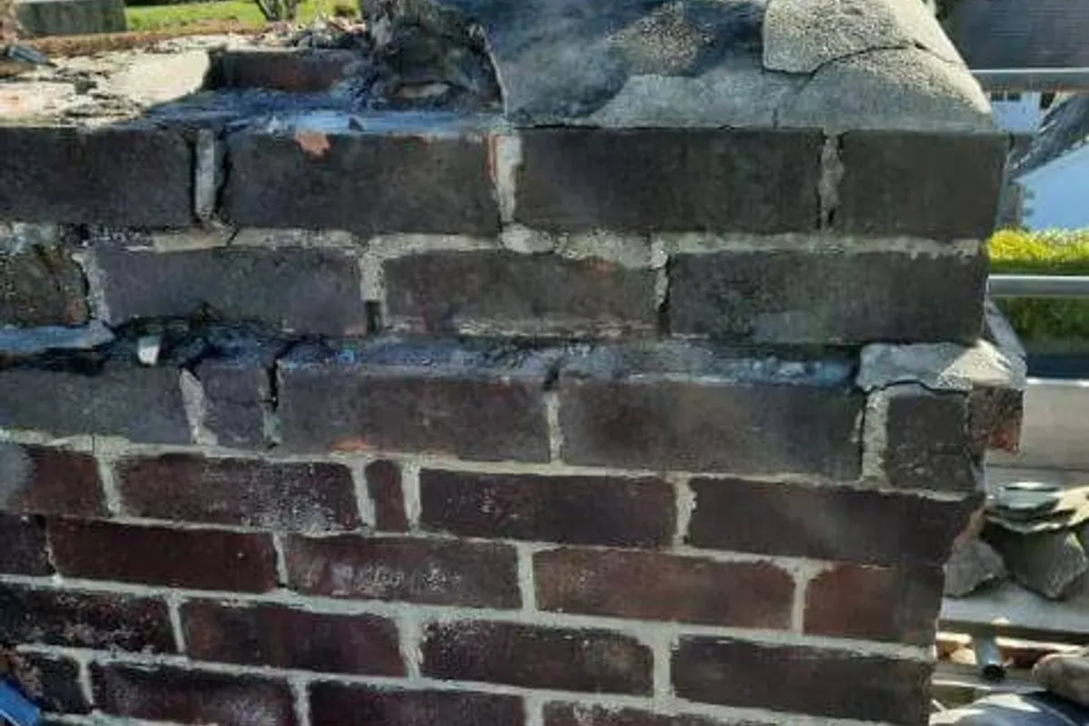 A repaired and repointed chimney stack on a Kent roof