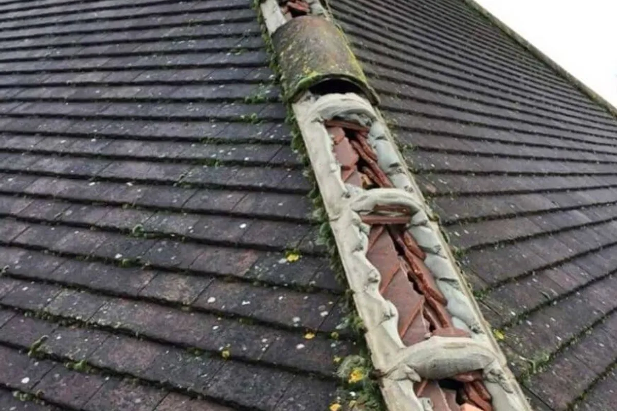 An emergency roof repair being made safe after storm damage